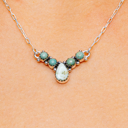 Sterling silver turquoise necklace with green cabochons and white center teardrop