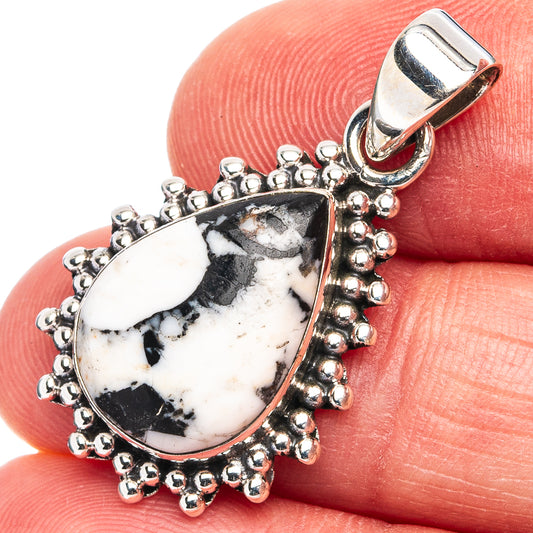 Teardrop white buffalo turquoise pendant in .925 sterling silver with beaded border