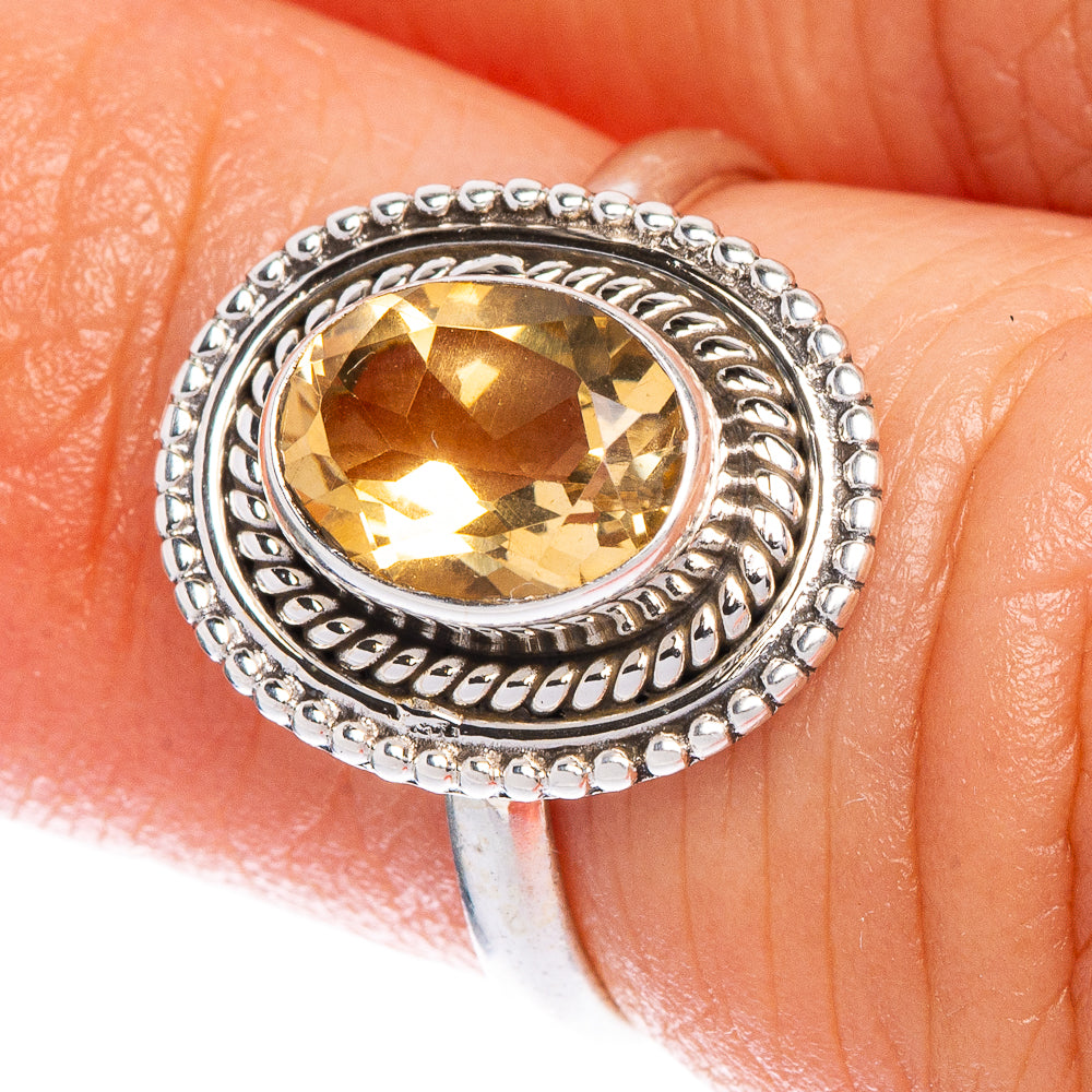 Sterling silver citrine ring with oval faceted gemstone and ornate beadwork