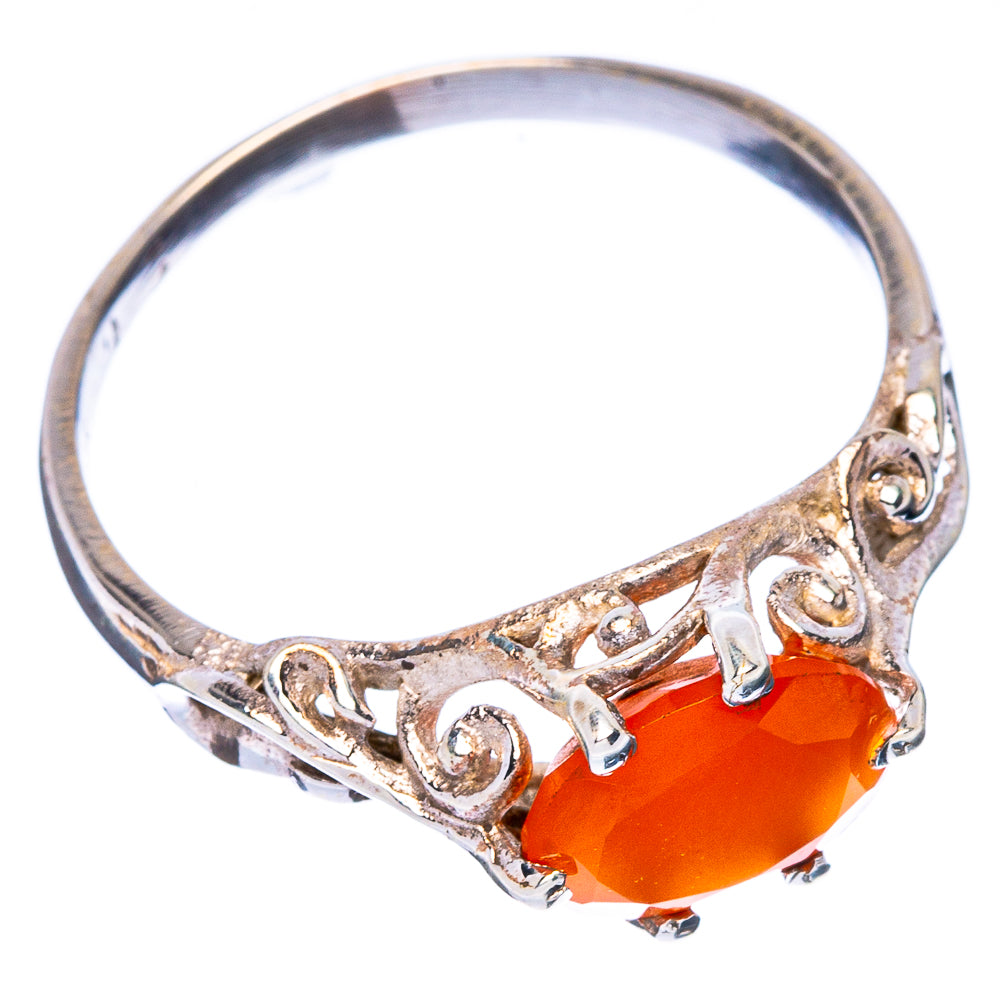Dainty silver ring with faceted orange carnelian stone and ornate filigree band