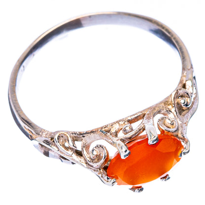 Dainty silver ring with faceted orange carnelian stone and ornate filigree band