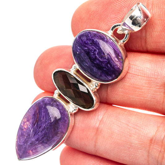 Sterling silver pendant with oval purple charoite and dark smoky quartz stones