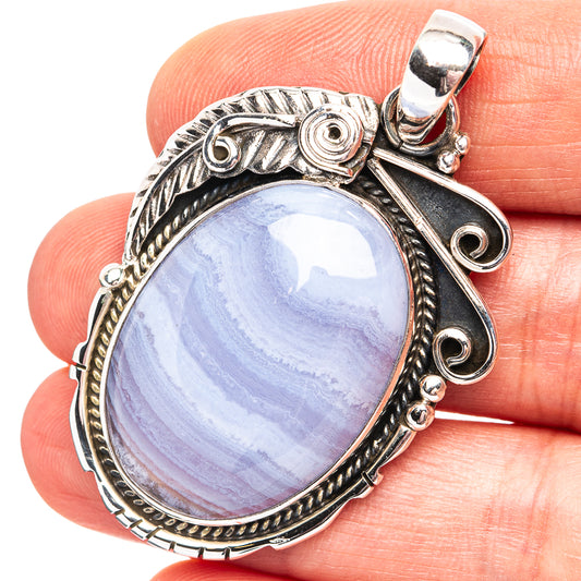 Oval blue lace agate pendant with .925 sterling silver bezel and bail