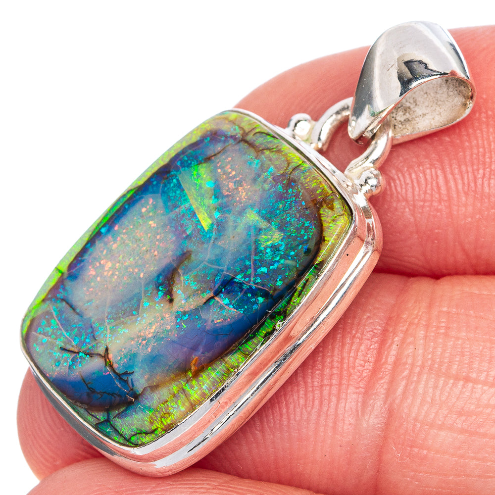 Sterling silver opal pendant with oval multicolor opal cabochon bezel