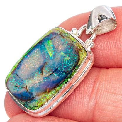 Sterling silver opal pendant with oval multicolor opal cabochon bezel