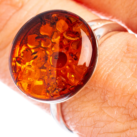 Round orange amber cabochon ring in .925 sterling silver