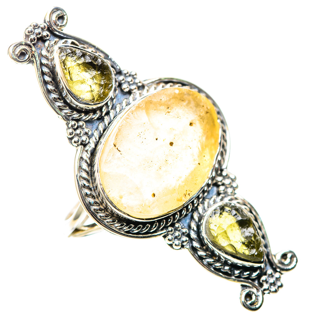 Sterling silver ring with large oval pale gold stone and two yellow teardrop accents
