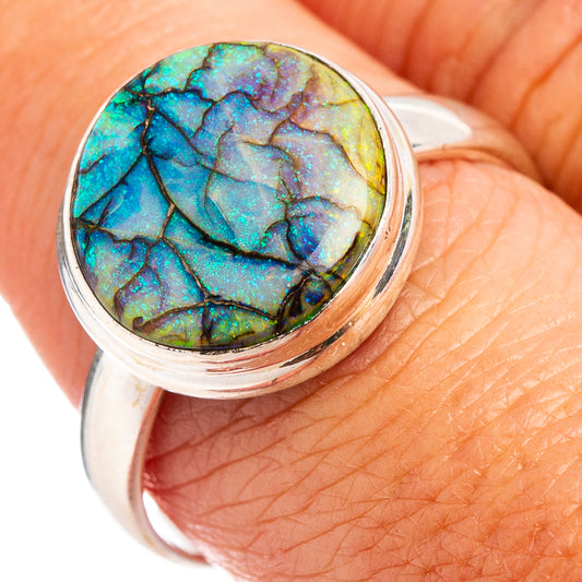 Round opal cabochon ring in sterling silver, blue-green iridescent stone bezel