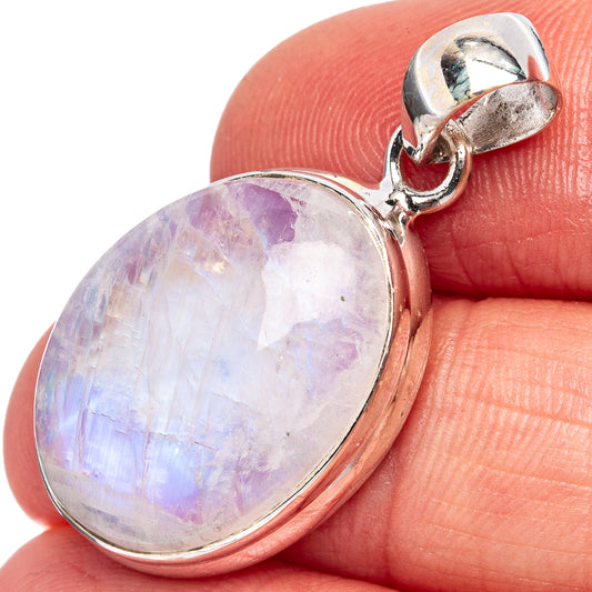Oval rainbow moonstone pendant in .925 sterling silver bezel with round bail, close-up