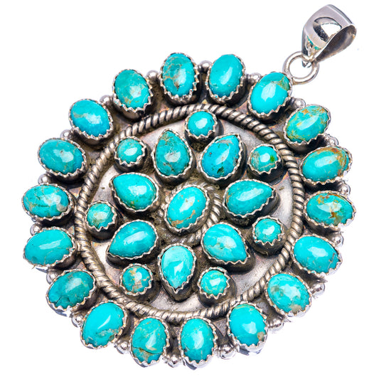 Round turquoise cabochon cluster pendant with .925 sterling silver scalloped edge