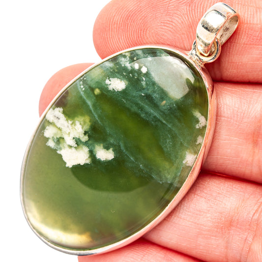 Chrome chalcedony pendant close-up: green oval cabochon in .925 sterling silver bail