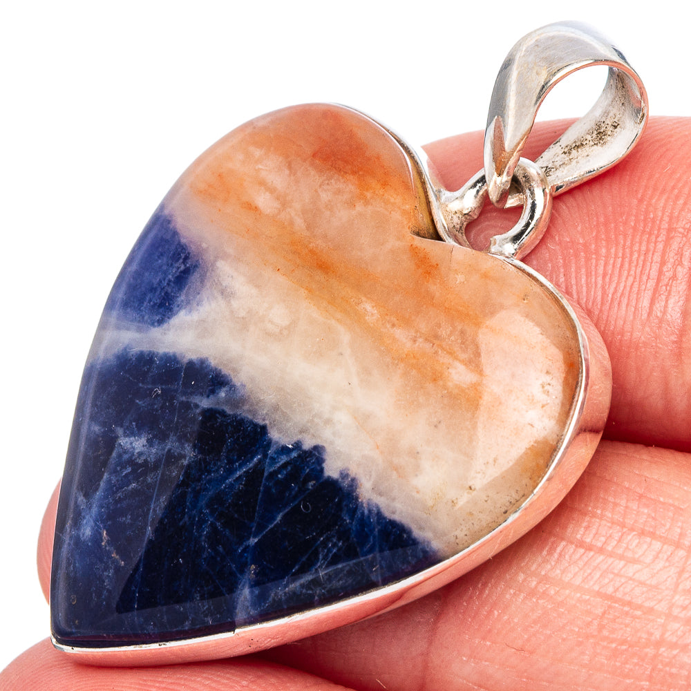 Heart-shaped sodalite pendant with .925 sterling silver bezel and loop bail