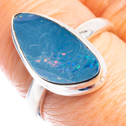 Sterling silver opal ring with blue teardrop doublet centerpiece