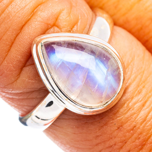 Sterling silver rainbow moonstone ring with iridescent oval cabochon, close-up