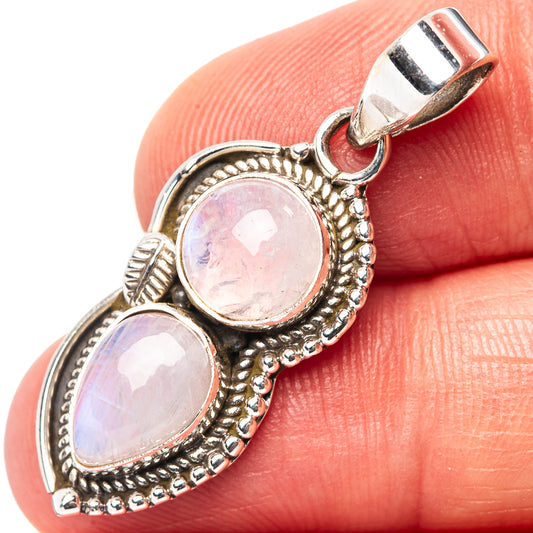 Sterling silver moonstone pendant, two oval opal-like stones in silver bezels
