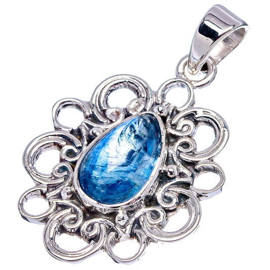 Sterling silver kyanite pendant with blue oval stone in ornate filigree