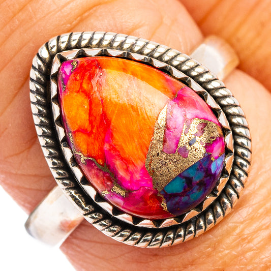 Sterling silver ring with oval multicolor gemstone center in pink, orange, purple