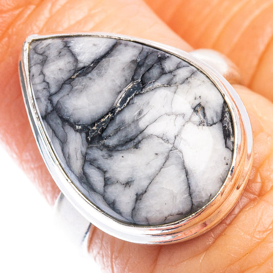 Sterling silver ring with teardrop gray-and-white jasper cabochon, black veining bezel