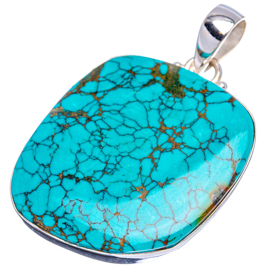 Oval turquoise pendant in .925 sterling silver bezel with top bail, webbed stone pattern