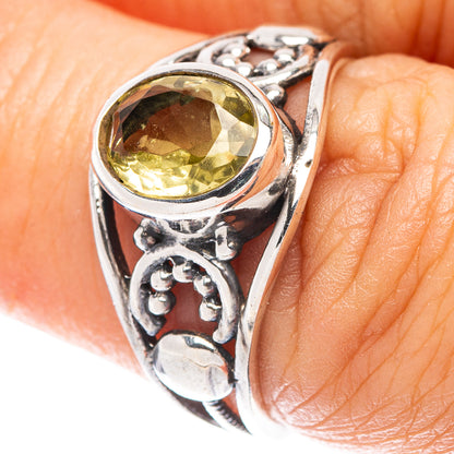 Faceted citrine dainty ring in 925 sterling silver with yellow gemstone, close-up