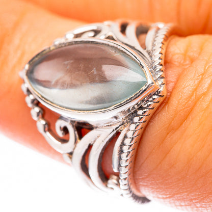 Sterling silver oval aquamarine ring with ornate filigree bezel, size 7.25