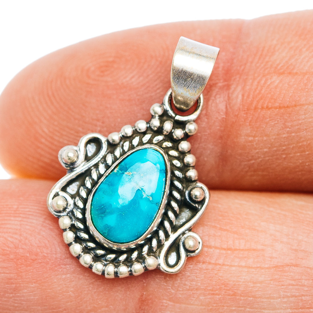 Turquoise teardrop pendant with beaded silver bezel and ornate frame, .925 sterling