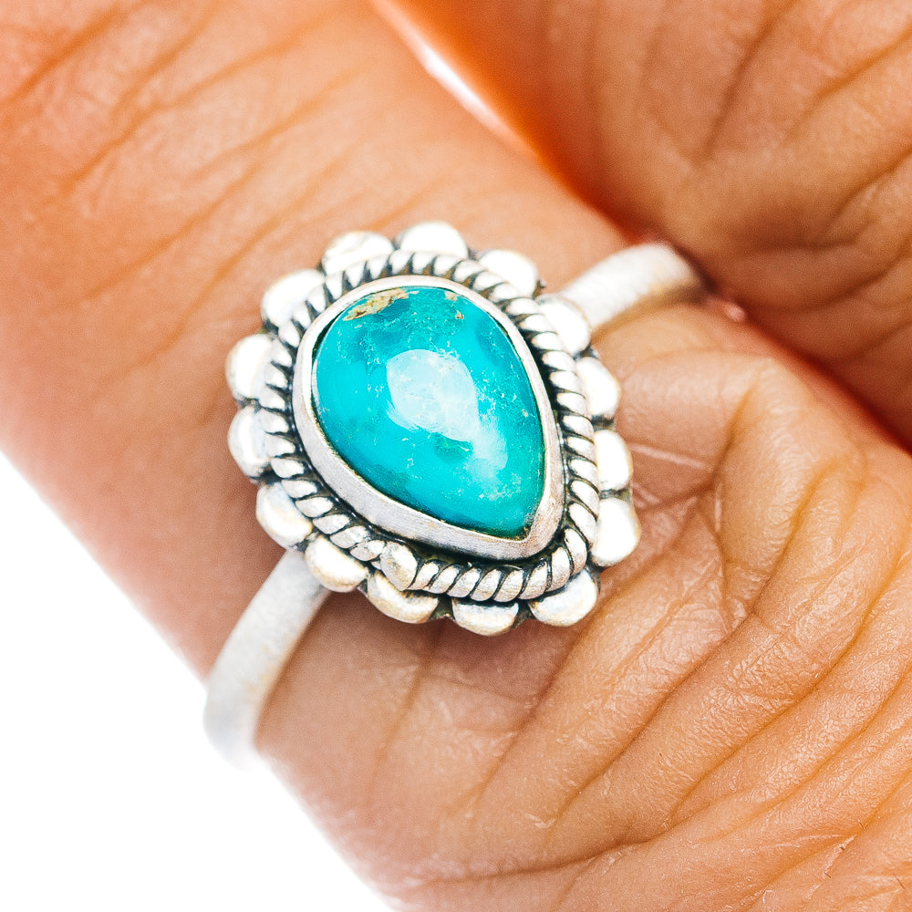 Sterling silver turquoise teardrop ring with rope-style bezel and scalloped edge