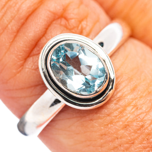 Sterling silver blue topaz ring with oval gemstone bezel, size 8.5
