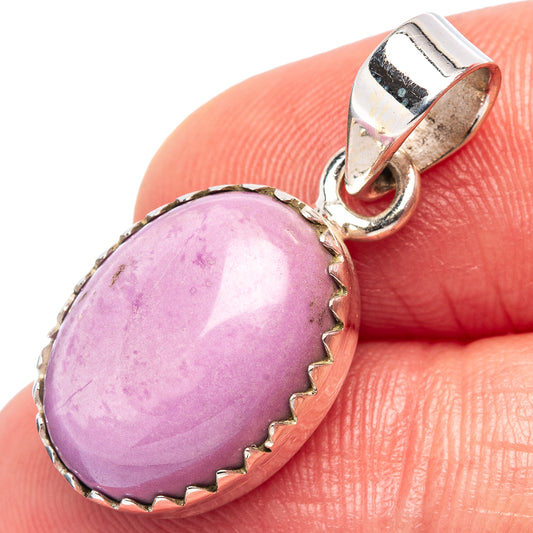 Sterling silver pendant with oval purple phosphosiderite cabochon, scalloped bezel