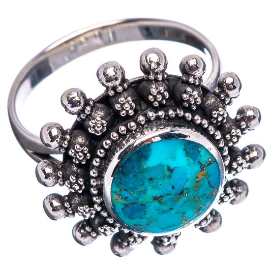 Sterling silver turquoise ring with round blue stone and beaded spiked crown, side view