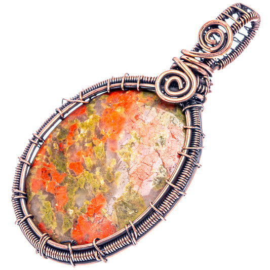 Unakite wire-wrap pendant with oxidized copper bezel and teardrop stone, full view