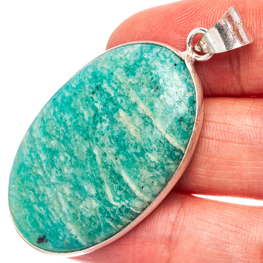 Amazonite pendant with silver-plated oval bezel, green speckled stone and loop