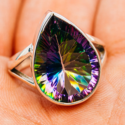 Sterling silver mystic topaz ring with pear-shaped faceted gemstone, prismatic rainbow.