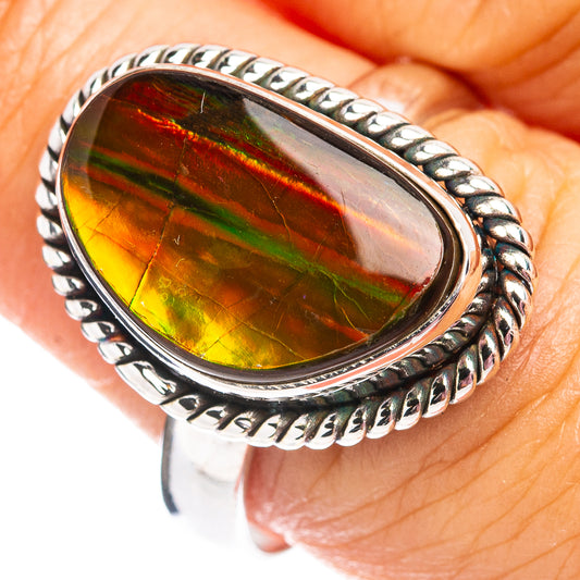 Sterling silver oval ammolite ring with multicolor red, green, and yellow stone bezel