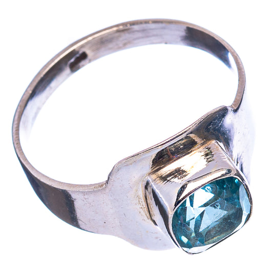 Sterling silver ring with blue topaz-style oval gemstone, open basket setting view