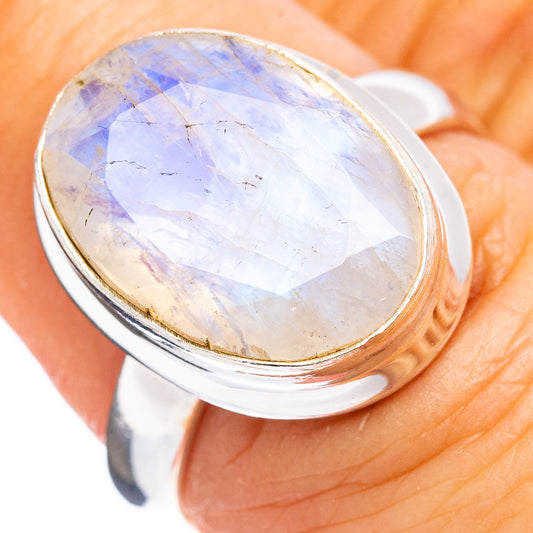 Sterling silver ring with oval opalescent moonstone cabochon and rainbow iridescence