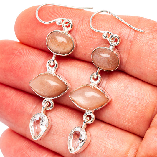 Peach moonstone and clear teardrop earrings with silver links and hook backs
