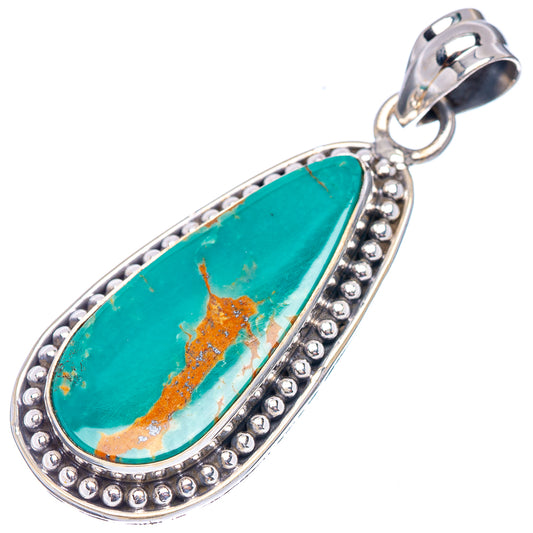 Turquoise teardrop pendant with ornate silver beaded frame and ring bail, oval top