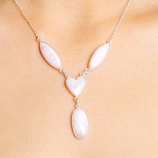 Sterling silver heart necklace with pink opal-like pendants, adjustable chain