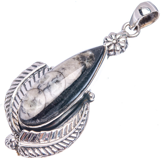 Sterling silver orthoceras fossil pendant with oval stone and ornate leaf-style frame