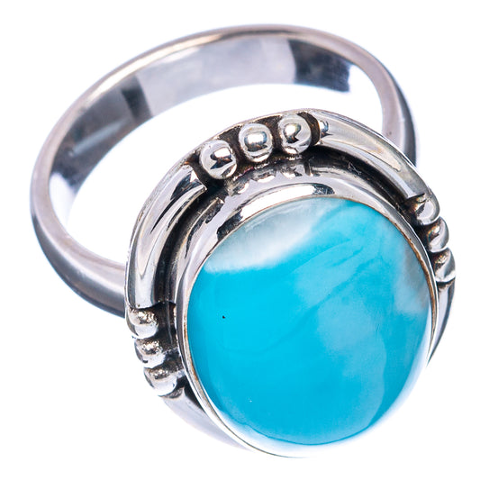 Blue oval larimar gemstone sterling silver ring with raised bezel and beaded side accents