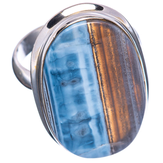 Sterling silver oval opal ring with blue cabochon and gold-brown vertical streak
