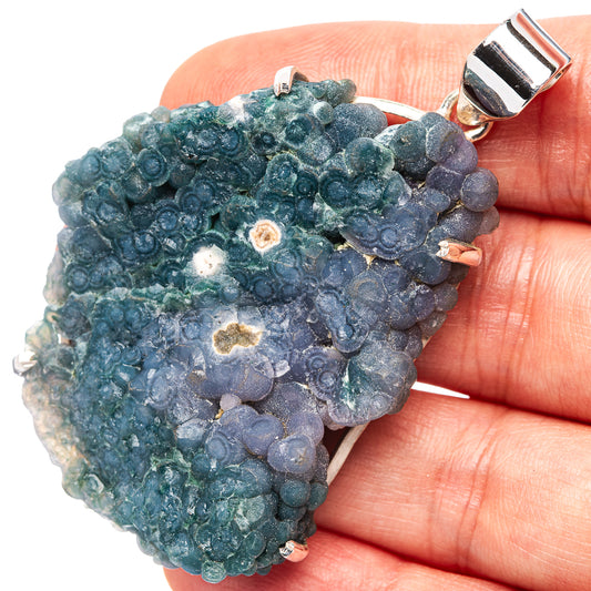 Grape agate pendant in druzy teal-blue and violet with silver bail, clasp on top