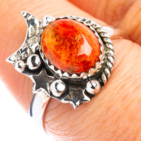 Sterling silver coral style ring with oval orange-red cabochon and starburst setting