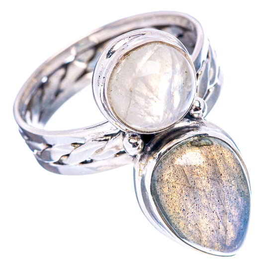 Sterling silver openwork ring with round white moonstone and oval blue-gray gemstone