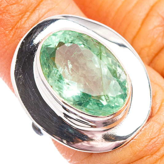 Oval faceted green fluorite set in .925 sterling silver ring