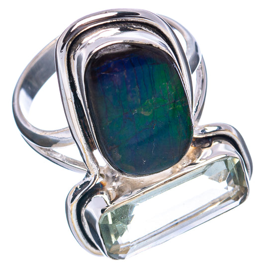 Sterling silver ring with dark green oval ammolite and clear baguette stone