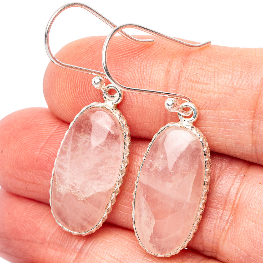 Rose quartz dangle earrings with oval pink stones in .925 sterling silver settings