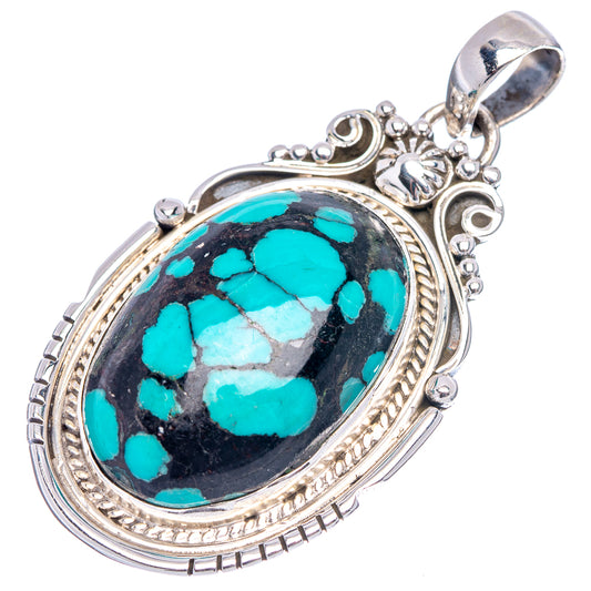 Sterling silver turquoise pendant, oval cabochon with intricate border and top bail