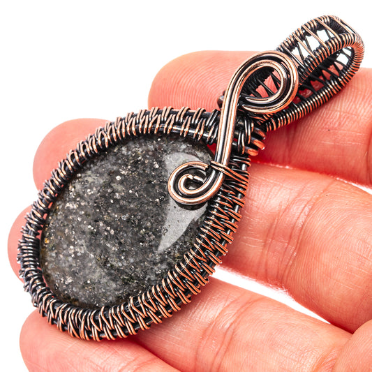 Oxidized copper wire-wrapped pendant with black druzy teardrop stone and bail